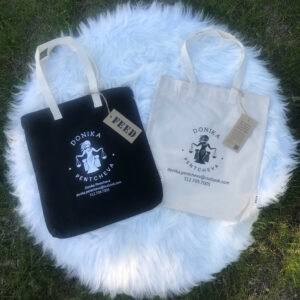 2026-05-12 Donika Pentcheva and FEED Projects - Photograph of Donika Pentcheva-Branded Tote Bags
