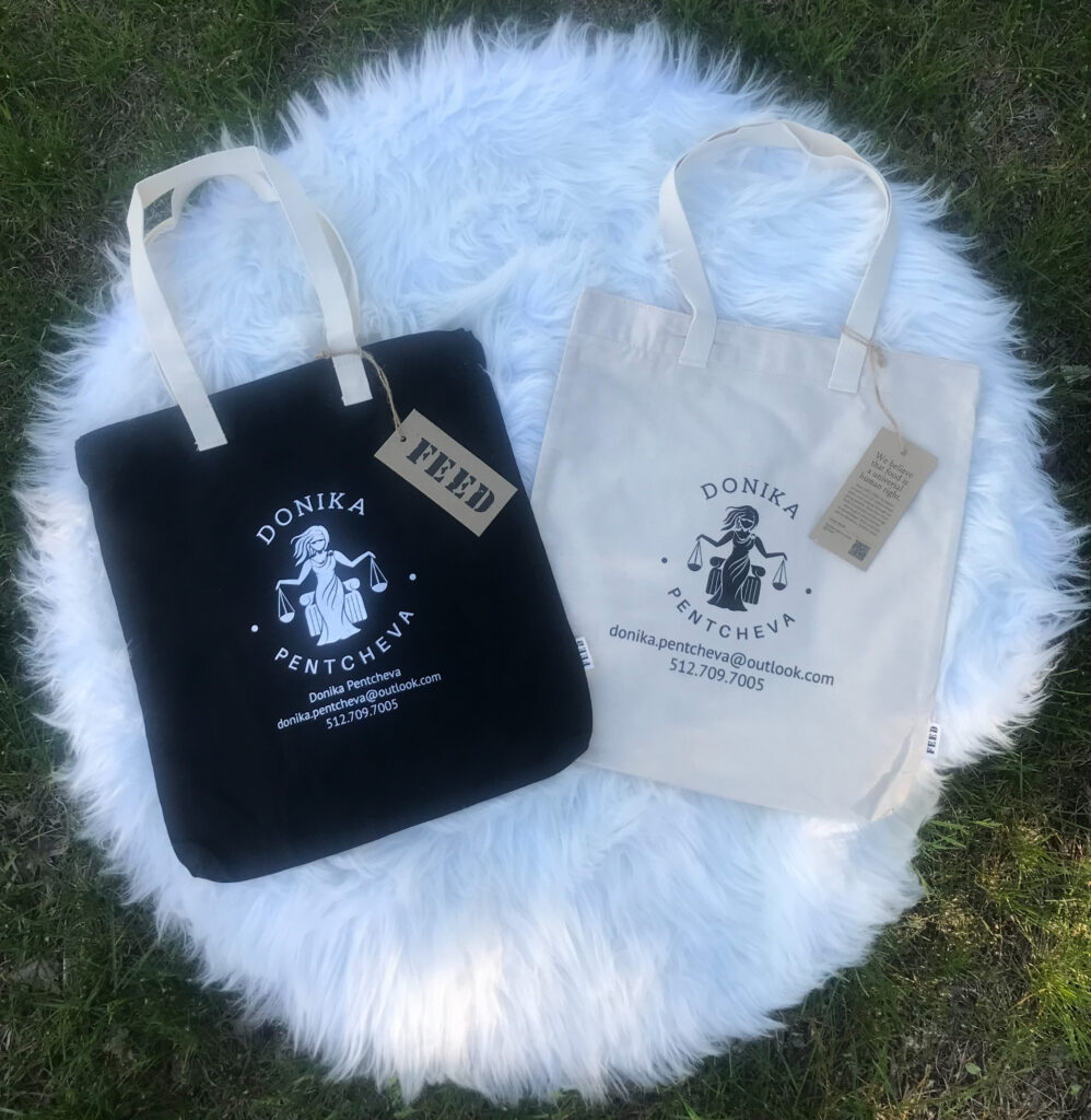 2026-05-12 Donika Pentcheva and FEED Projects - Photograph of Donika Pentcheva-Branded Tote Bags